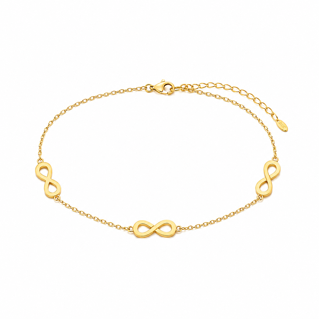 A gold chain bracelet featuring three polished infinity symbols spaced evenly along the front, displayed on a clean white background.