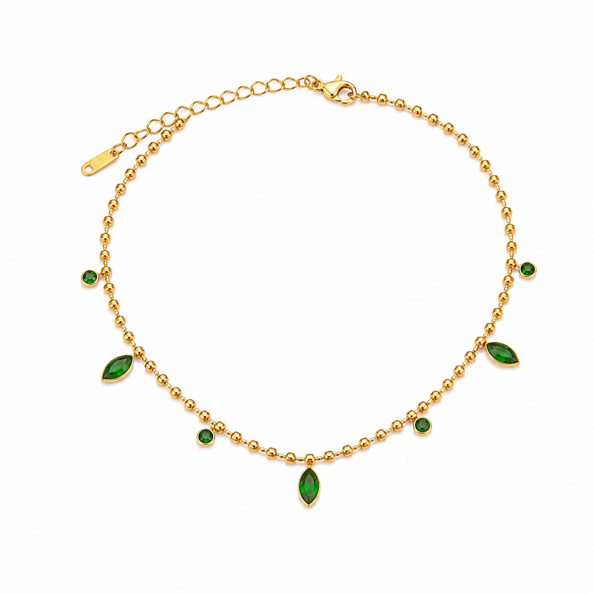 A gold ball-chain necklace with green marquise and round gemstone accents, displayed on a clean white background.