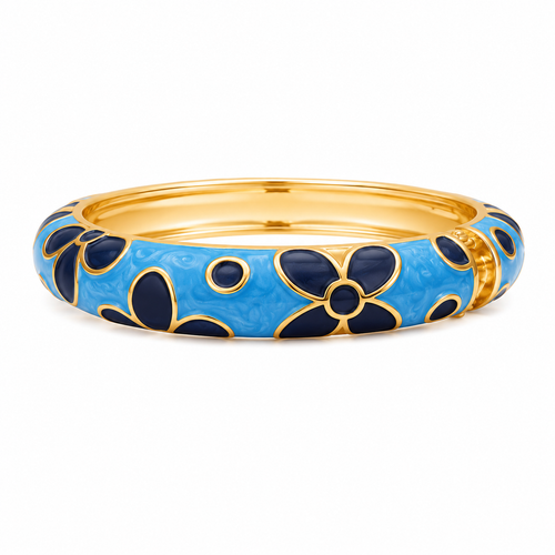 A gold-plated bangle bracelet featuring a vibrant blue enamel outer band decorated with dark navy blue floral motifs outlined in gold, shown against a plain white background.