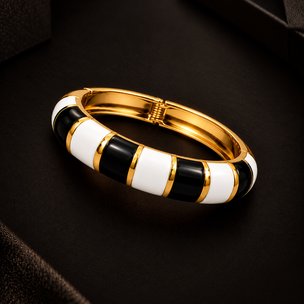 1. Modern gold bangle featuring bold monochrome enamel panels for women