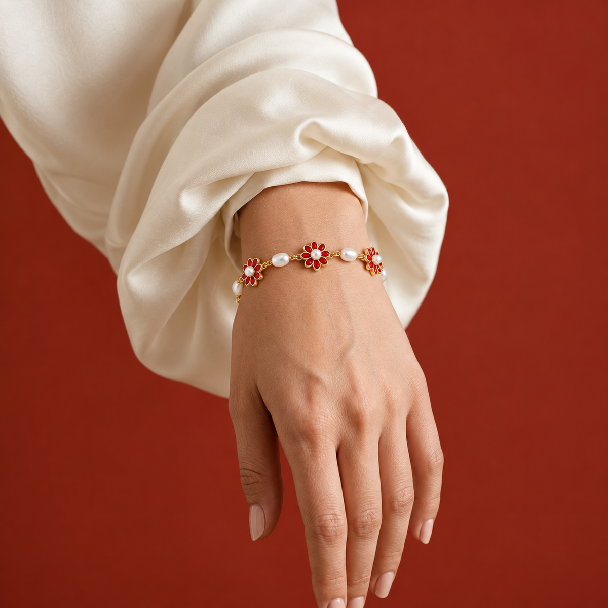 Red floral pearl bracelet with gold chain and flower charms