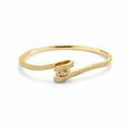 A gold wrap-style bangle bracelet adorned with pavé-set clear stones, shown on a clean white background.