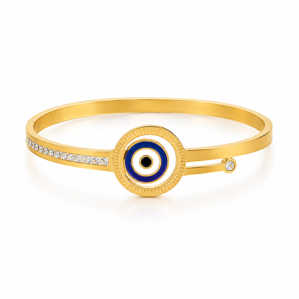 Gold bangle bracelet with a central evil eye motif in blue, white, and black, accented by a row of small clear stones on one side and a single stone on the other, shown on a white background.