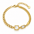 A gold chain bracelet with a square mother-of-pearl centerpiece and a rectangular clear gemstone accent, displayed on a clean white background.