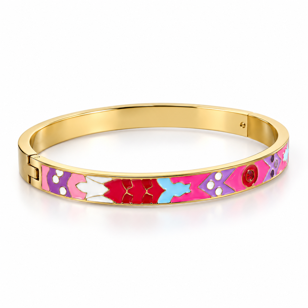 A gold-plated bangle bracelet featuring a colorful enamel pattern with pink, purple, red, and light blue geometric shapes, set against a clean white background.