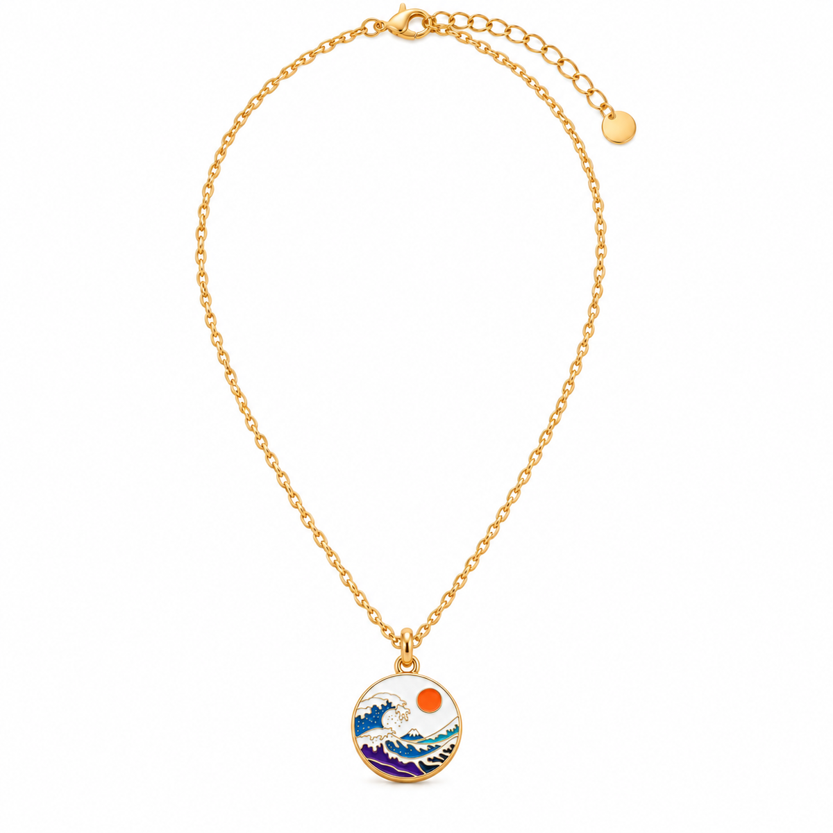 A gold chain necklace with a circular pendant featuring an enameled wave design in blue, white, and purple with a red sun, displayed on a clean white background.