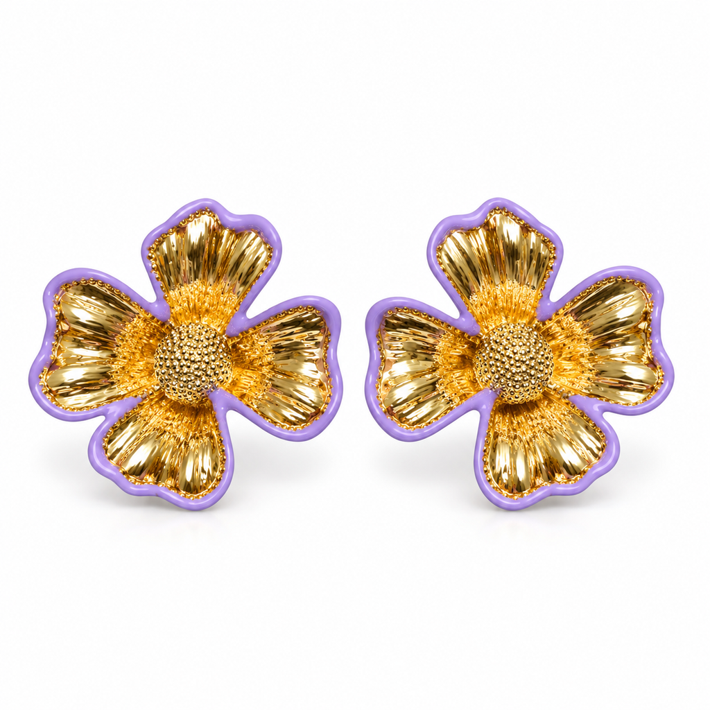 A pair of gold flower-shaped earrings with textured petals, a gold center, and a purple outer border, shown on a plain white background.