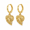 A pair of gold hoop earrings with dangling heart-shaped wire filigree pendants, each accented with a small clear gemstone, shown on a plain white background.