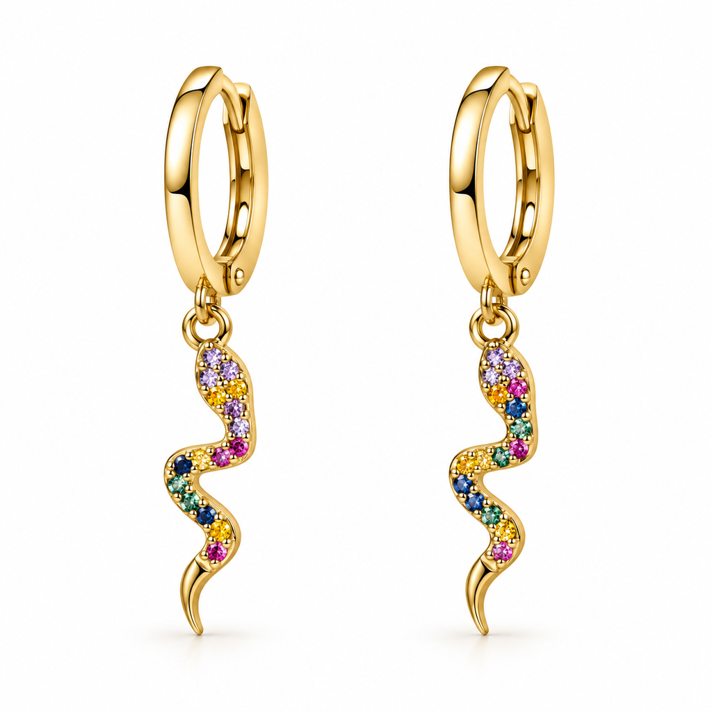A pair of gold huggie hoop earrings with dangling wavy chains paved with multicolored gemstones, shown on a clean white background.