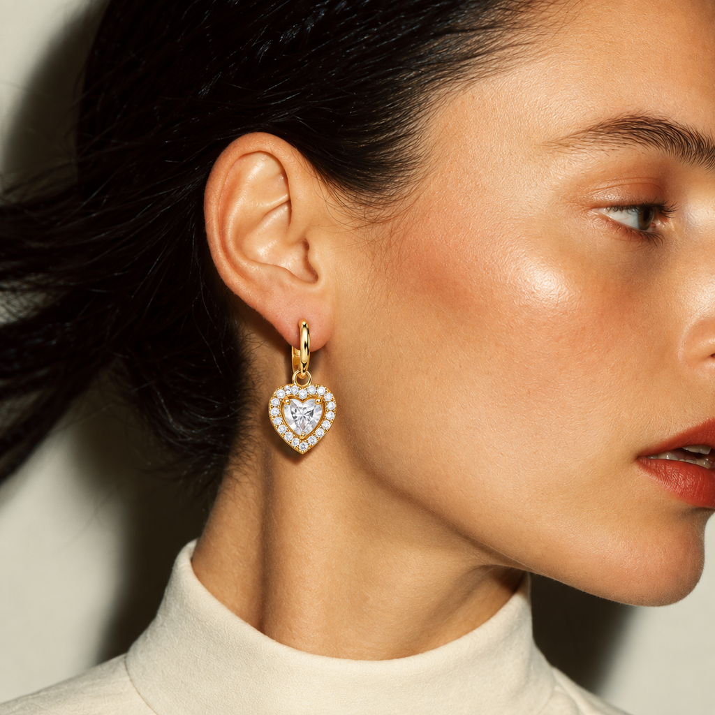 Elegant gold heart earrings with sparkling CZ accents