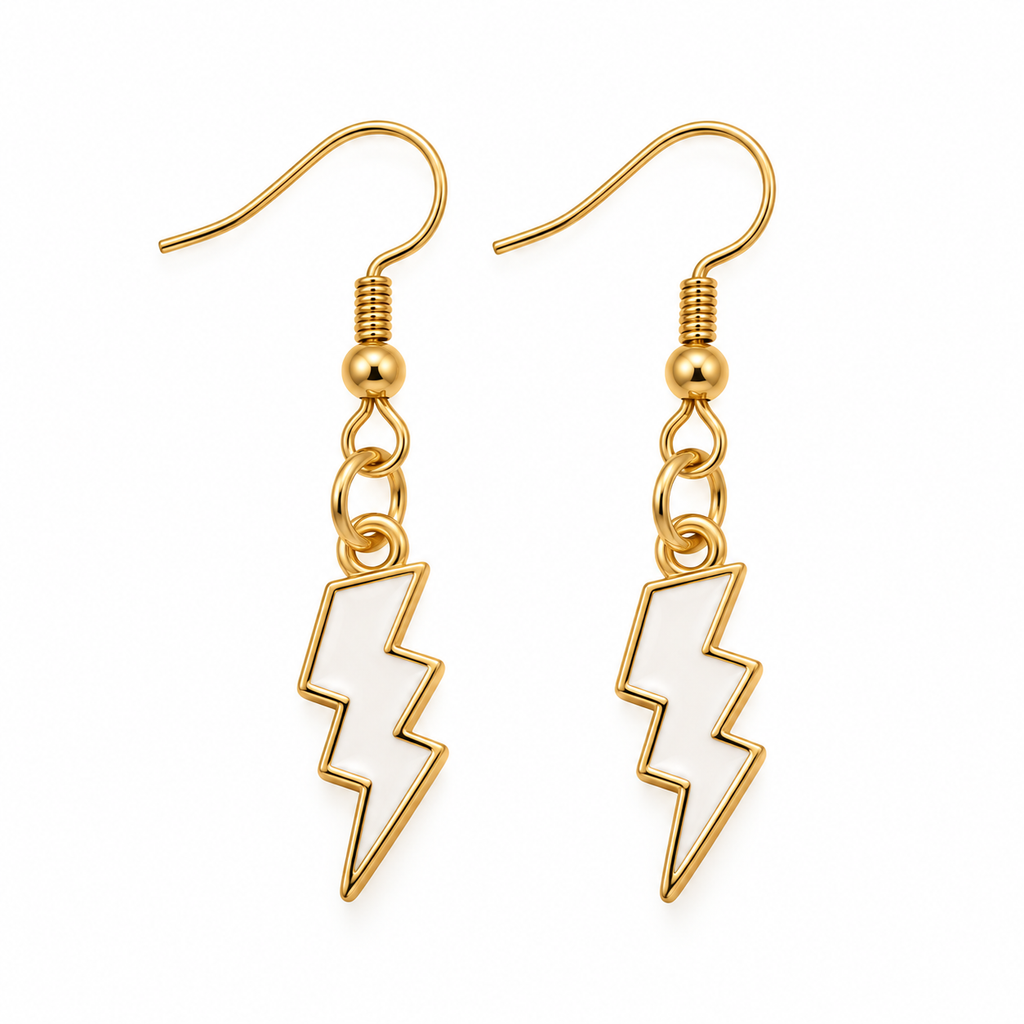 A pair of gold-tone lightning bolt drop earrings with white enamel fillings, shown on a plain white background.