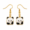 A pair of gold-tone dangle earrings featuring cute cartoon panda charms with black and white enamel details, shown on a plain white background.