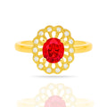 A yellow gold ring featuring an oval-cut red center stone surrounded by a scalloped halo of small clear stones, shown on a white background with a soft reflection below.
