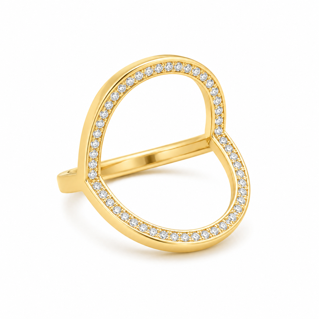 A gold open heart-shaped ring set with small clear pavé stones along the outer edges, shown on a clean white background.