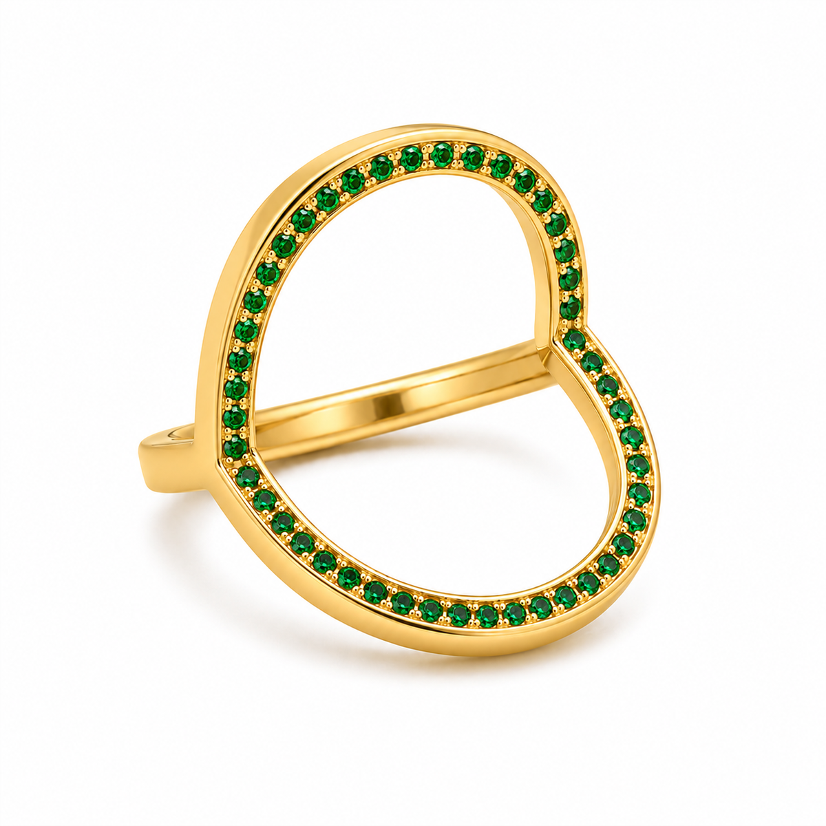 A gold open heart-shaped ring adorned with small green gemstones along the outer edges, shown on a clean white background.