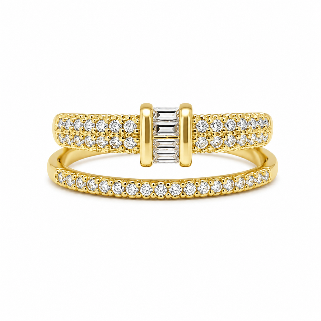 A yellow gold double-band ring set with pavé diamonds and a central baguette diamond cluster, shown on a clean white background.